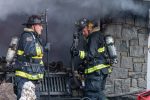 Two firefighters in smokey building Thumbnail